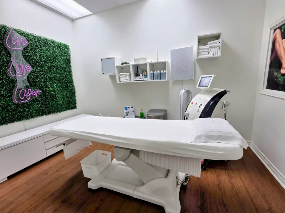 Glow Room at Bonita Laser in Mississauga with laser treatment bed and Soprano laser equipment